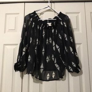 Sheer off-shoulder top w/ triangle patterns